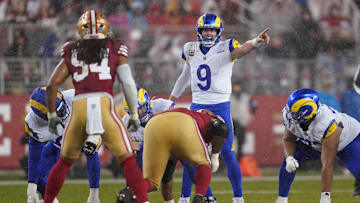Dec 12, 2024; Santa Clara, California, USA; Los Angeles Rams quarterback Matthew Stafford (9) directs teammates before a play against the San Francisco 49ers in the second quarter at Levi's Stadium. Mandatory Credit: Cary Edmondson-Imagn Images