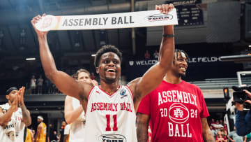 Yogi Ferrell (left) and Troy Williams (right) celebrate Assembly Ball's win over The Cru in The Basketball Tournament.