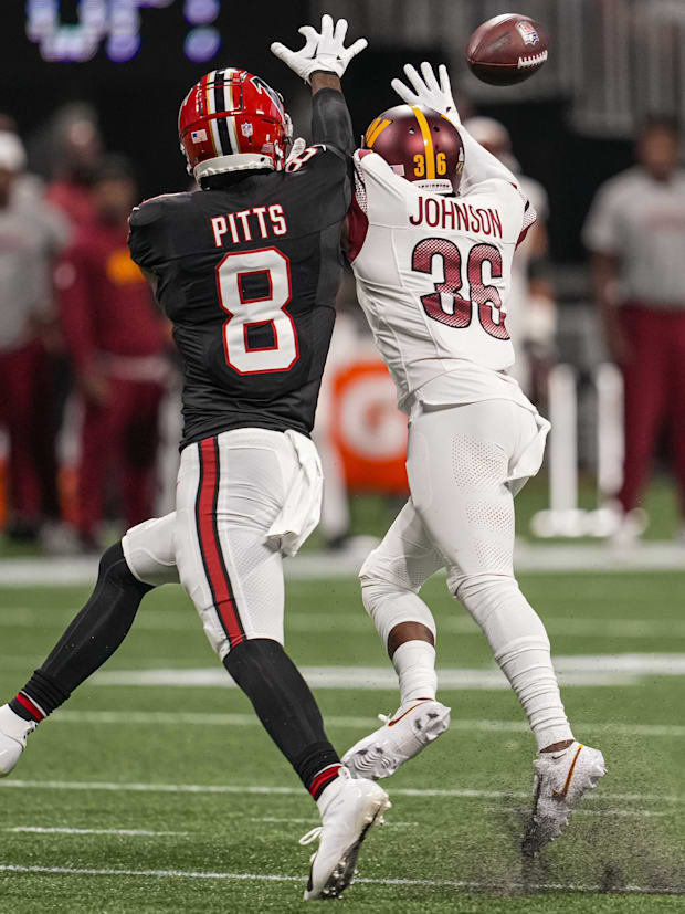 Washington Commanders cornerback Danny Johnson (36) breaks up a pass intended for Atlanta Falcons tight end Kyle Pitts (8). Washington Commanders cornerback Danny Johnson (36) breaks up a pass intended for Atlanta Falcons tight end Kyle Pitts (8).