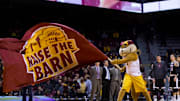 Nov 27, 2015; Minneapolis, MN, USA; Minnesota Gophers mascot Goldy Gopher waves the raise the barn flag before the game against the Omaha Mavericks at Williams Arena. Mandatory Credit: Brad Rempel-Imagn Images