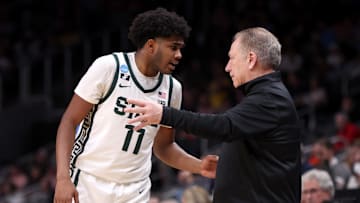 Mar 28, 2025; Atlanta, GA, USA; Michigan State Spartans guard Jase Richardson (11) talks to head coach Tom Izzo in the first half of a South Regional semifinal of the 2025 NCAA tournament against the Mississippi Rebels at State Farm Arena. Mandatory Credit: Brett Davis-Imagn Images