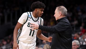 Michigan State Spartans guard Jase Richardson (11) talks to head coach Tom Izzo 