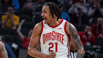 Mar 12, 2025; Indianapolis, IN, USA; Ohio State Buckeyes forward Devin Royal (21) celebrates a play in the second half against the Iowa Hawkeyes at Gainbridge Fieldhouse. Mandatory Credit: Trevor Ruszkowski-Imagn Images