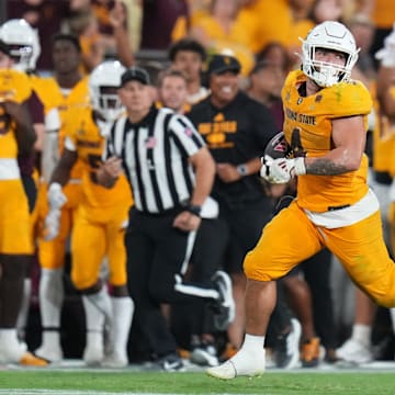 Arizona State running back Cam Skattebo breaks away to seal the game, finishing with 262 yards rushing on the day against the Mississippi State Bulldogs at Mountain America Stadium on Sept. 7, 2024, in Tempe.