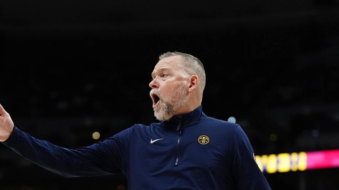Apr 6, 2025; Denver, Colorado, USA; Denver Nuggets head coach Michael Malone reacts in the second half against the Indiana Pacers at Ball Arena. Mandatory Credit: Ron Chenoy-Imagn Images