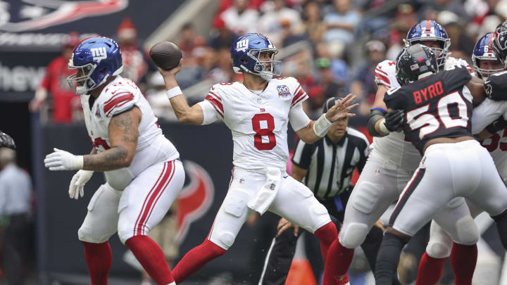 Aug 17, 2024; Houston, Texas, USA; New York Giants quarterback Daniel Jones (8) attempts a pass during the second quarter against the Houston Texans at NRG Stadium.  