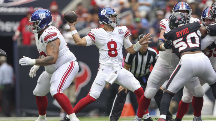 Aug 17, 2024; Houston, Texas, USA; New York Giants quarterback Daniel Jones (8) attempts a pass during the second quarter against the Houston Texans at NRG Stadium. Mandatory Credit: Troy Taormina-USA TODAY Sports