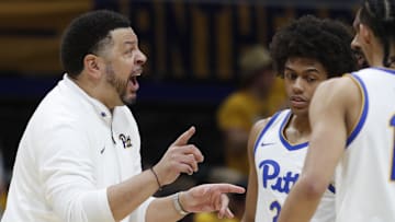 Feb 25, 2025; Pittsburgh, Pennsylvania, USA;  Pittsburgh Panthers head coach Jeff Capel talks to guard Brandin Cummings (3) and guard Jaland Lowe (right) against the Georgia Tech Yellow Jackets during the second half at the Petersen Events Center. Mandatory Credit: Charles LeClaire-Imagn Images