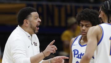 Feb 25, 2025; Pittsburgh, Pennsylvania, USA;  Pittsburgh Panthers head coach Jeff Capel talks to guard Brandin Cummings (3) and guard Jaland Lowe (right) against the Georgia Tech Yellow Jackets during the second half at the Petersen Events Center. Mandatory Credit: Charles LeClaire-Imagn Images