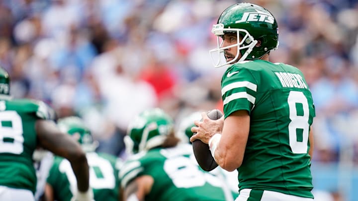 New York Jets quarterback Aaron Rodgers (8) looks for a receiver against the Tennessee Titans during the second quarter at Nissan Stadium in Nashville, Tenn., Sunday, Sept. 15, 2024.