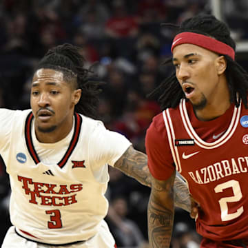 Mar 27, 2025; San Francisco, CA, USA; Arkansas Razorbacks guard Boogie Fland (2) drives to the hoop past Texas Tech Red Raiders guard Elijah Hawkins (3) during the first half during a West Regional semifinal of the 2025 NCAA tournament at Chase Center. Mandatory Credit: Eakin Howard-Imagn Images