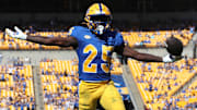 Oct 4, 2025; Pittsburgh, Pennsylvania, USA;  Pittsburgh Panthers running back Ja'Kyrian Turner (25) reacts in the end zone after scoring a touchdown against the Boston College Eagles during the second quarter at Acrisure Stadium. Mandatory Credit: Charles LeClaire-Imagn Images