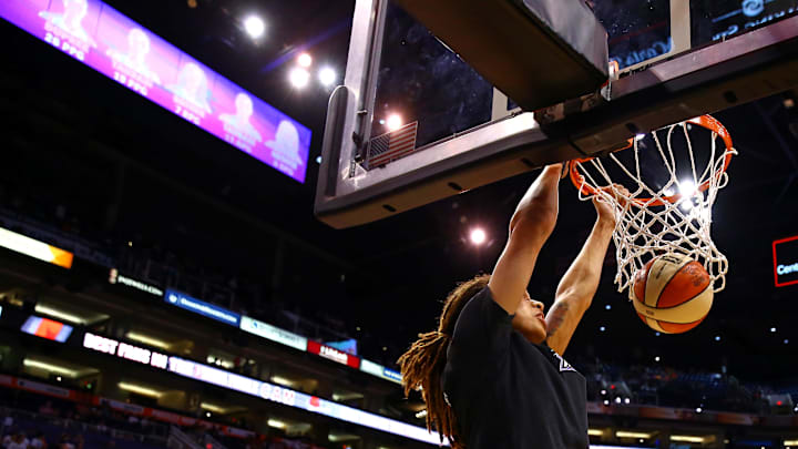 Sep 9, 2014; Phoenix, AZ, USA; Phoenix Mercury center Brittney Griner (42) dunks the ball against the Chicago Sky during game two of the WNBA Finals at US Airways Center. The Mercury defeated the Sky 97-68. Mandatory Credit: Mark J. Rebilas-Imagn Images Sep 9, 2014; Phoenix, AZ, USA; Phoenix Mercury center Brittney Griner (42) dunks the ball against the Chicago Sky during game two of the WNBA Finals at US Airways Center. The Mercury defeated the Sky 97-68. Mandatory Credit: Mark J. Rebilas-Imagn Images