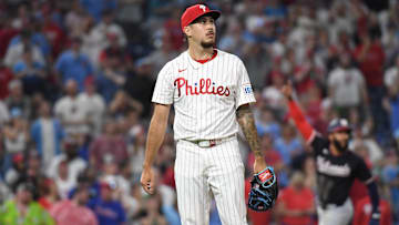 Apr 29, 2025; Philadelphia, Pennsylvania, USA; Philadelphia Phillies pitcher Orion Kerkering (50) watches the baseball after allowing a three-run home run during the ninth inning against the Washington Nationals at Citizens Bank Park