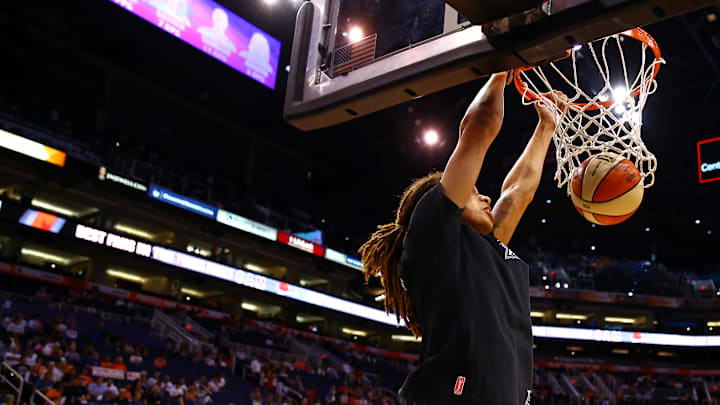 Sep 9, 2014; Phoenix, AZ, USA; Phoenix Mercury center Brittney Griner (42) dunks the ball against the Chicago Sky during game two of the WNBA Finals at US Airways Center. The Mercury defeated the Sky 97-68. Mandatory Credit: Mark J. Rebilas-Imagn Images