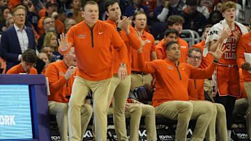 Dec 6, 2024; Evanston, Illinois, USA; Illinois Fighting Illini head coach Brad Underwood  gestures to his team against the Northwestern Wildcats during the first half at Welsh-Ryan Arena. Mandatory Credit: David Banks-Imagn Images