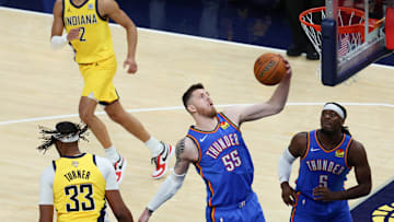 Jun 19, 2025; Indianapolis, Indiana, USA; Oklahoma City Thunder center Isaiah Hartenstein (55) rebounds against the Indiana Pacers in the first quarter during game six of the 2025 NBA Finals at Gainbridge Fieldhouse. Mandatory Credit: Trevor Ruszkowski-Imagn Images