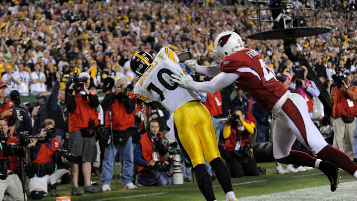 Pittsburgh Steelers wide receiver Santonio Holmes gets his toes down to score the game-winning touchdown. Pittsburgh Steelers wide receiver Santonio Holmes gets his toes down to score the game-winning touchdown.