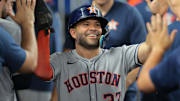 Aug 4, 2025; Miami, Florida, USA; Houston Astros second baseman Jose Altuve (27) celebrates after scoring against the Miami Marlins during the fourth inning at loanDepot Park. Mandatory Credit: Sam Navarro-Imagn Images