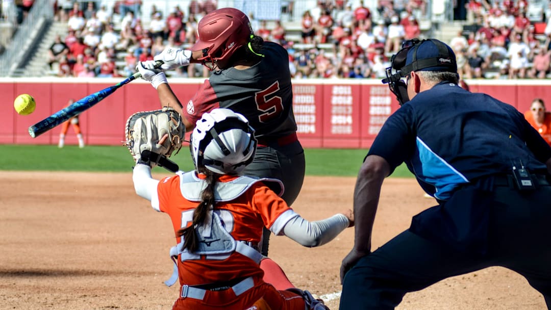 Oklahoma utility Ella Parker hits a ball against Sam Houston.