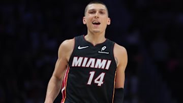 Apr 3, 2025; Miami, Florida, USA; Miami Heat guard Tyler Herro (14) reacts after scoring against the Memphis Grizzlies during the third quarter at Kaseya Center. Mandatory Credit: Sam Navarro-Imagn Images