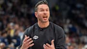 Apr 27, 2025; Minneapolis, Minnesota, USA; Los Angeles Lakers head coach JJ Redick lobbies for possession due to a Minnesota Timberwolves player kicking the ball in the third quarter during game four of first round for the 2025 NBA Playoffs at Target Center. Mandatory Credit: Matt Blewett-Imagn Images