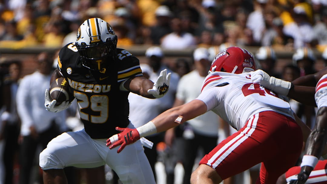 Sept 13, 2025; Columbia, Missouri, USA; Missouri Tigers running back Ahmad Hardy blocks during a rush against Louisiana in the first quarter at Faurot Field. 
