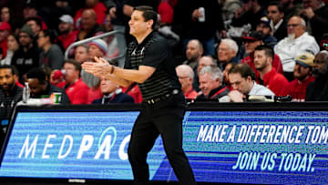 Cincinnati Bearcats head coach Wes Miller cheers on players in the first half of a NCAA men’s basketball game between the Cincinnati Bearcats and Kansas State Wildcats, Wednesday, March 5, 2025, at Fifth Third Arena in Cincinnati.
