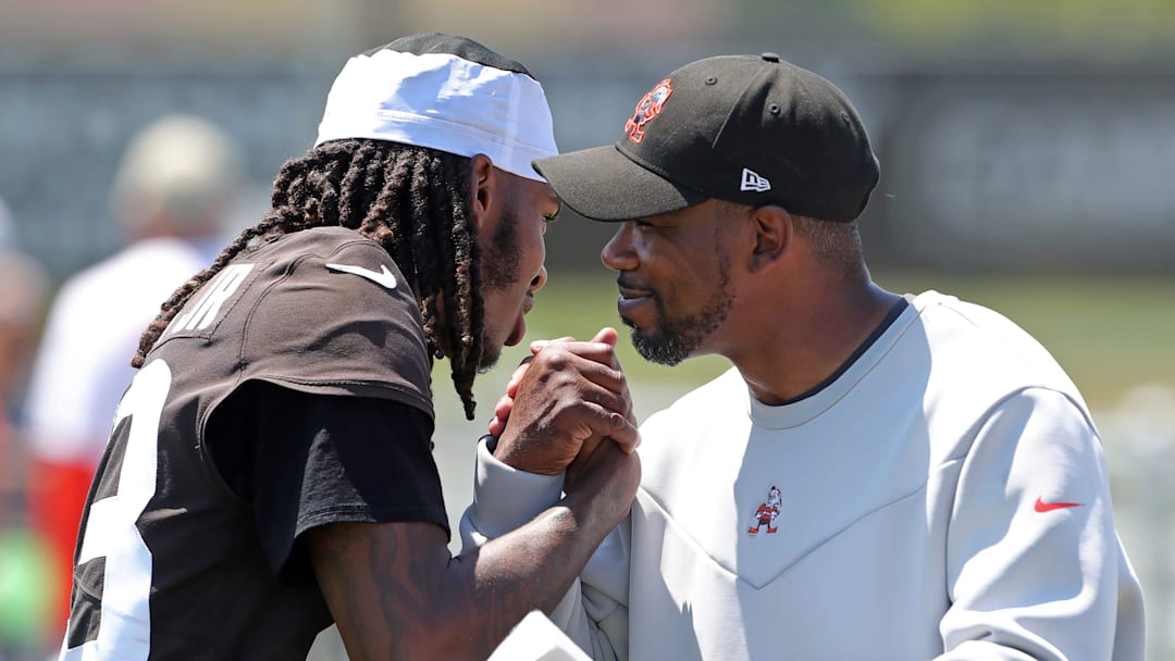Browns cornerback Martin Emerson Jr. hugs cornerbacks coach Brandon Lynch after minicamp practice, Thursday, June 13, 2024, in Berea.