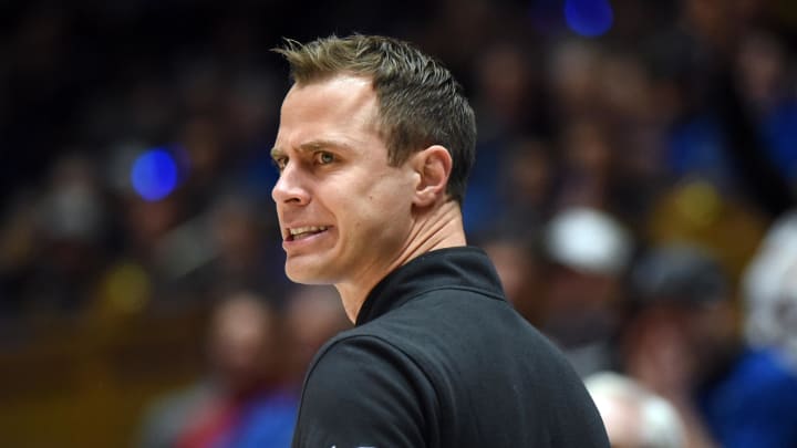 Duke basketball head coach Jon Scheyer versus Louisville