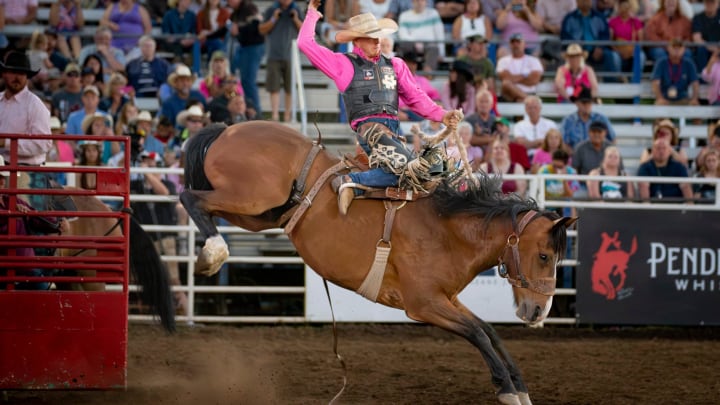 Rodeo action at a 2023 Idaho Stampede Pro Rodeo. 