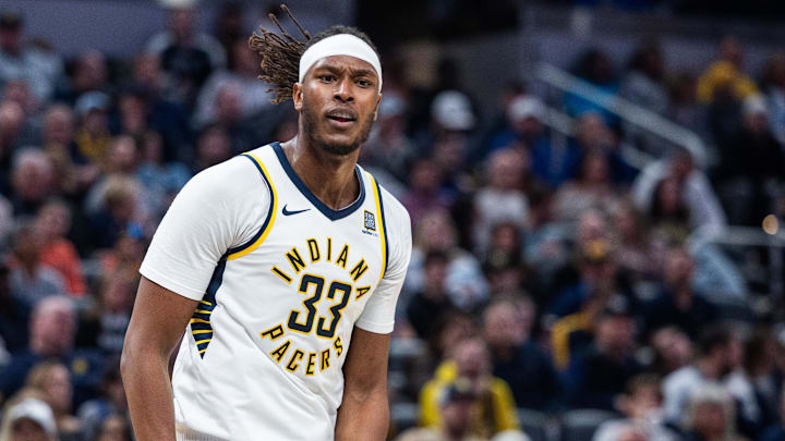 Feb 26, 2025; Indianapolis, Indiana, USA; Indiana Pacers center Myles Turner (33) celebrates a made basket in the second half against the Toronto Raptors at Gainbridge Fieldhouse. Mandatory Credit: Trevor Ruszkowski-Imagn Images