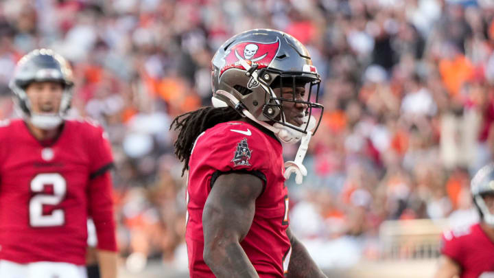 Tampa Bay Buccaneers running back Bucky Irving (7) celebrates a touchdown carry in the first quarter of the NFL Preseason Week 1 game between the Cincinnati Bengals and the Tampa Bay Buccaneers at Paycor Stadium in downtown Cincinnati on Saturday, Aug. 10, 2024.