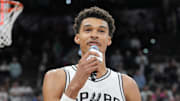 Oct 26, 2024; San Antonio, Texas, USA;  San Antonio Spurs center Victor Wembanyama (1) addresses the crowd after a victory over the Houston Rockets at Frost Bank Center. Mandatory Credit: Daniel Dunn-Imagn Images