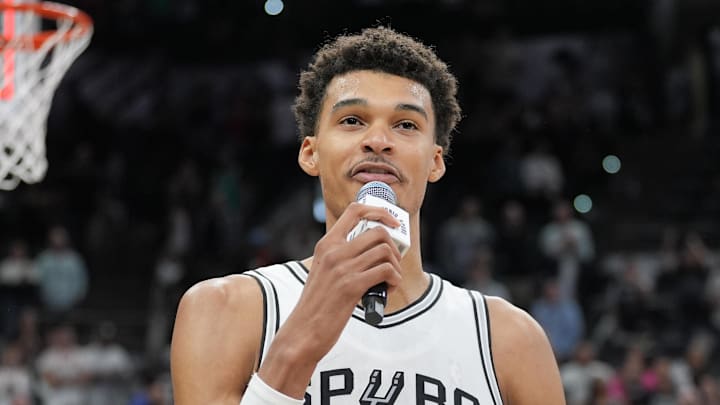 Oct 26, 2024; San Antonio, Texas, USA;  San Antonio Spurs center Victor Wembanyama (1) addresses the crowd after a victory over the Houston Rockets at Frost Bank Center. Mandatory Credit: Daniel Dunn-Imagn Images