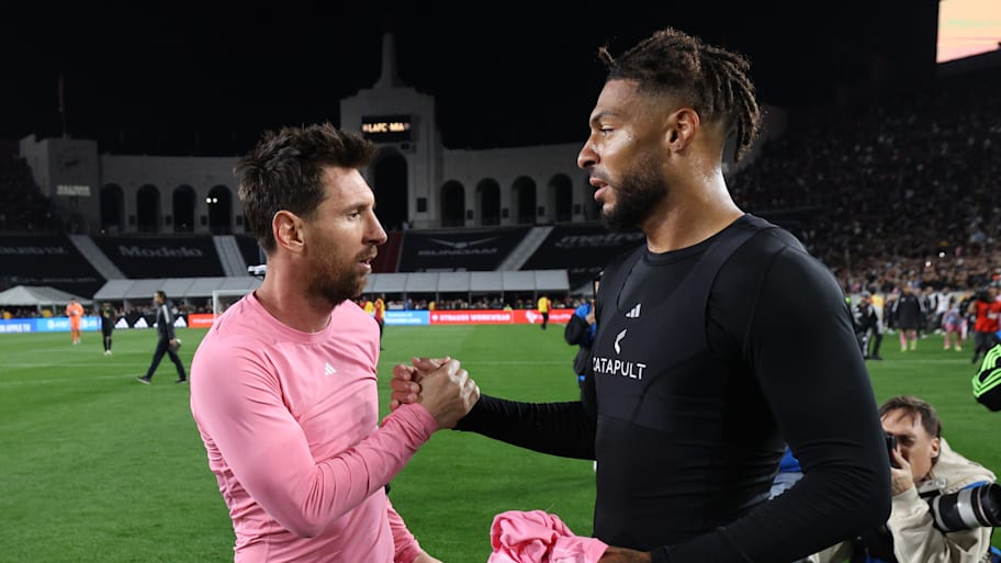Lionel Messi (left) and Denis Bouanga.