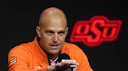 Oct 23, 2024; Kansas City, MO, USA; Oklahoma State Cowboys head coach Steve Lutz talks to media during the Big 12 Men’s Basketball Media Day at T-Mobile Center. Mandatory Credit: Jay Biggerstaff-Imagn Images