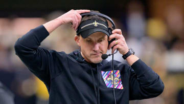 Oct 19, 2023; New Orleans, Louisiana, USA; New Orleans Saints head coach Dennis Allen adjusts his headset against the Jacksonville Jaguars at the Caesars Superdome. Mandatory Credit: Matthew Hinton-USA TODAY Sports