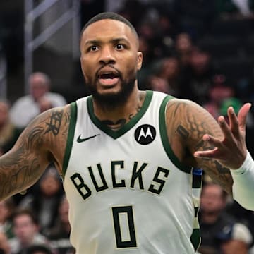 Nov 13, 2023; Milwaukee, Wisconsin, USA; Milwaukee Bucks guard Damian Lillard (0) reacts to a call in the second quarter against the Chicago Bulls at Fiserv Forum. Mandatory Credit: Benny Sieu-Imagn Images