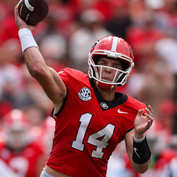 Sep 6, 2025; Athens, Georgia, USA; Georgia Bulldogs quarterback Gunner Stockton (14) throws a pass against the Austin Peay Governors in the first quarter at Sanford Stadium. Mandatory Credit: Brett Davis-Imagn Images