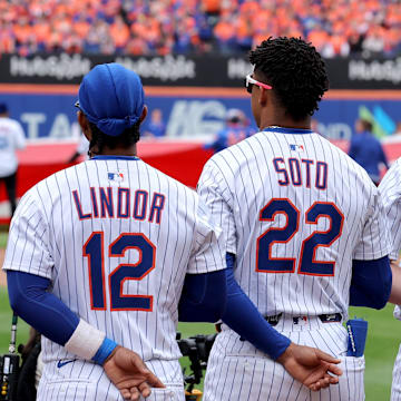 Apr 4, 2025; New York City, New York, USA; New York Mets shortstop Francisco Lindor (12) and right fielder Juan Soto (22) and first baseman Pete Alonso (20) and left fielder Brandon Nimmo (9) stand for the national anthem before the Mets home opener against the Toronto Blue Jays at Citi Field. Mandatory Credit: Brad Penner-Imagn Images