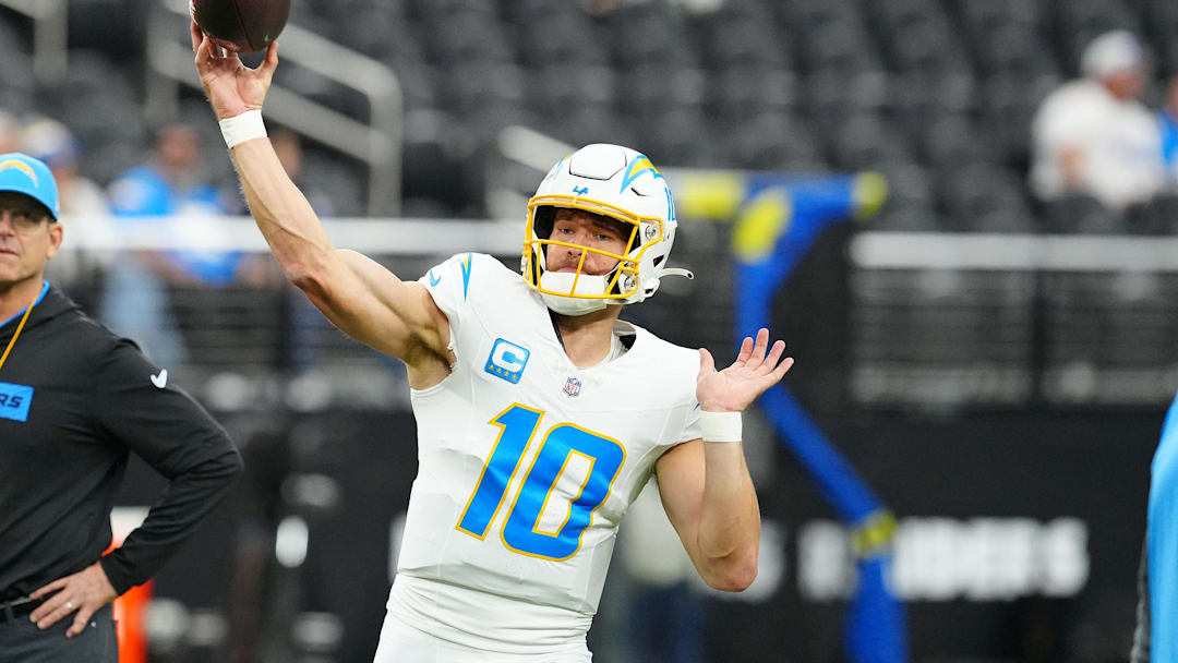 Jan 5, 2025; Paradise, Nevada, USA; Los Angeles Chargers quarterback Justin Herbert (10) warms up before a game against the Las Vegas Raiders at Allegiant Stadium. Mandatory Credit: Stephen R. Sylvanie-Imagn Images