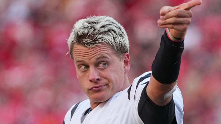 Sep 15, 2024; Kansas City, Missouri, USA; Cincinnati Bengals quarterback Joe Burrow (9) gestures for a first down against the Kansas City Chiefs during the second half at GEHA Field at Arrowhead Stadium. 