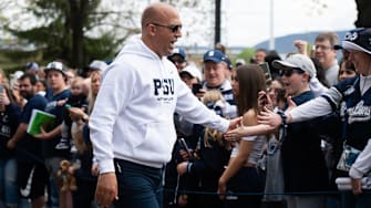 Penn State football coach James Franklin greets fans outside Beaver Stadium before the 2025 Blue-White Game. 