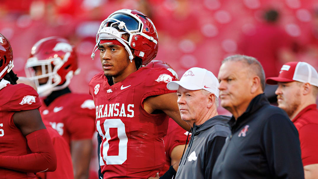 Arkansas Razorback quarterback Taylen Green, offensive coordinator Bobby Petrino and head coach Sam Pittman watch from the sideline during last season's home loss to the LSU Tigers.