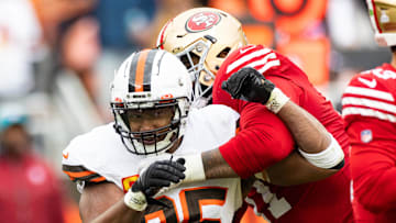 Oct 15, 2023; Cleveland, Ohio, USA; Cleveland Browns defensive end Myles Garrett (95) is blocked by San Francisco 49ers offensive tackle Trent Williams (71) during the third quarter at Cleveland Browns Stadium. Mandatory Credit: Scott Galvin-Imagn Images