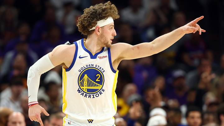 Apr 17, 2026; Phoenix, Arizona, USA; Golden State Warriors guard Brandin Podziemski (2) reacts against the Phoenix Suns during the first half in the play-in rounds of the 2026 NBA Playoffs at Mortgage Matchup Center. Mandatory Credit: Mark J. Rebilas-Imagn Images