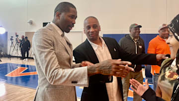 Former NBA guard Jamal Crawford, left, and his longtime high school coach in Mike Bethea, were part of blue-ribbon cutting ceremonies Saturday, introducing the new Rainier Beach HS gymnasium to the public.
