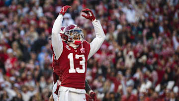 Nov 30, 2024; Tuscaloosa, Alabama, USA; Alabama Crimson Tide defensive back Malachi Moore (13) celebrates after a play against the Auburn Tigers during the second quarter at Bryant-Denny Stadium. Mandatory Credit: Will McLelland-Imagn Images