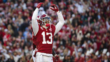 Nov 30, 2024; Tuscaloosa, Alabama, USA; Alabama Crimson Tide defensive back Malachi Moore (13) celebrates after a play against the Auburn Tigers during the second quarter at Bryant-Denny Stadium. Mandatory Credit: Will McLelland-Imagn Images